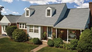 Beautiful two-story home with a large light gray roof.